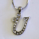 Initial Pendent, Initial U